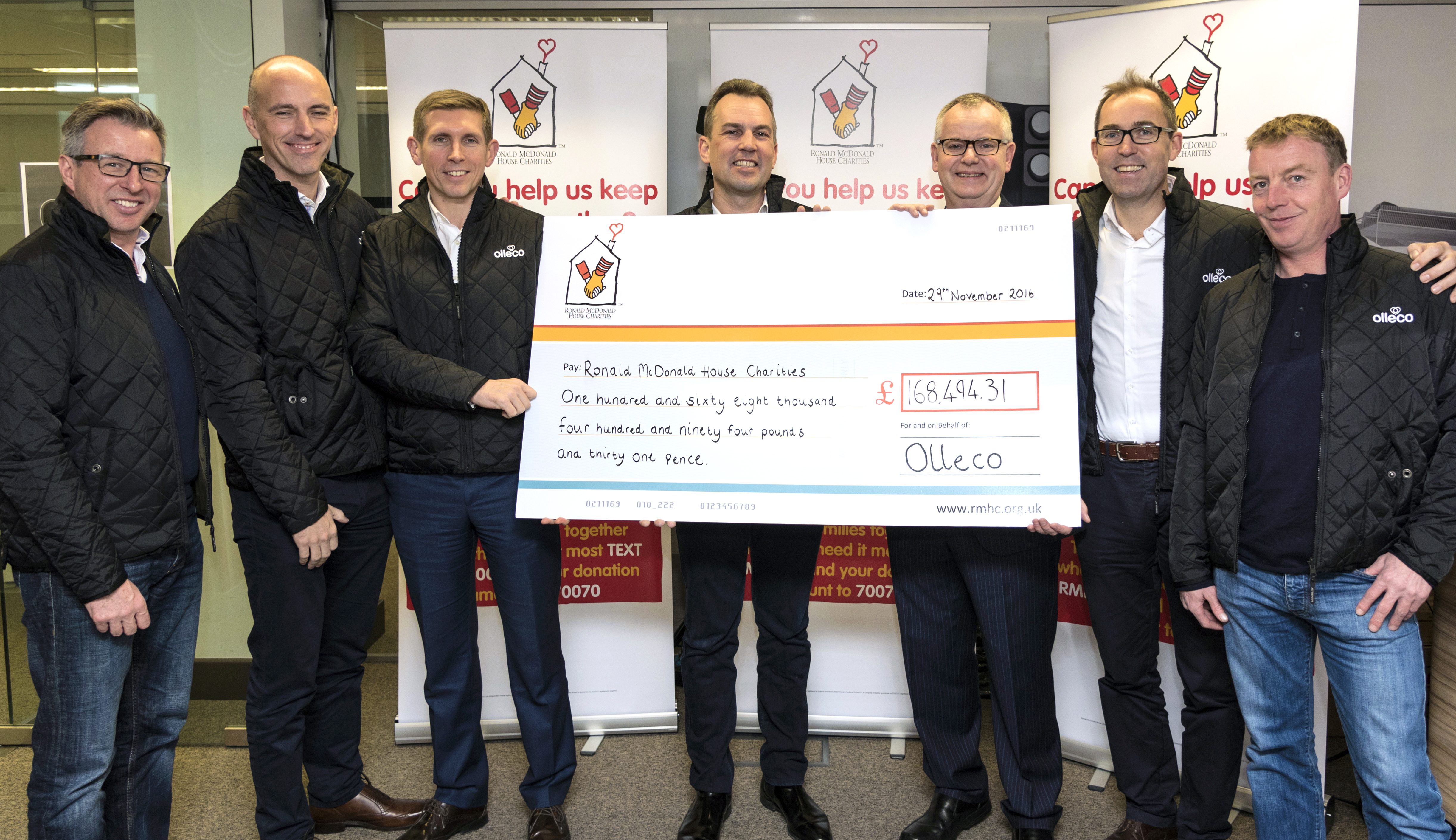 Olleco presenting cheque to RMHC